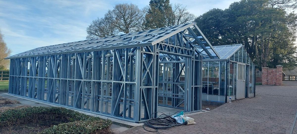 The long roof frame spanning the building